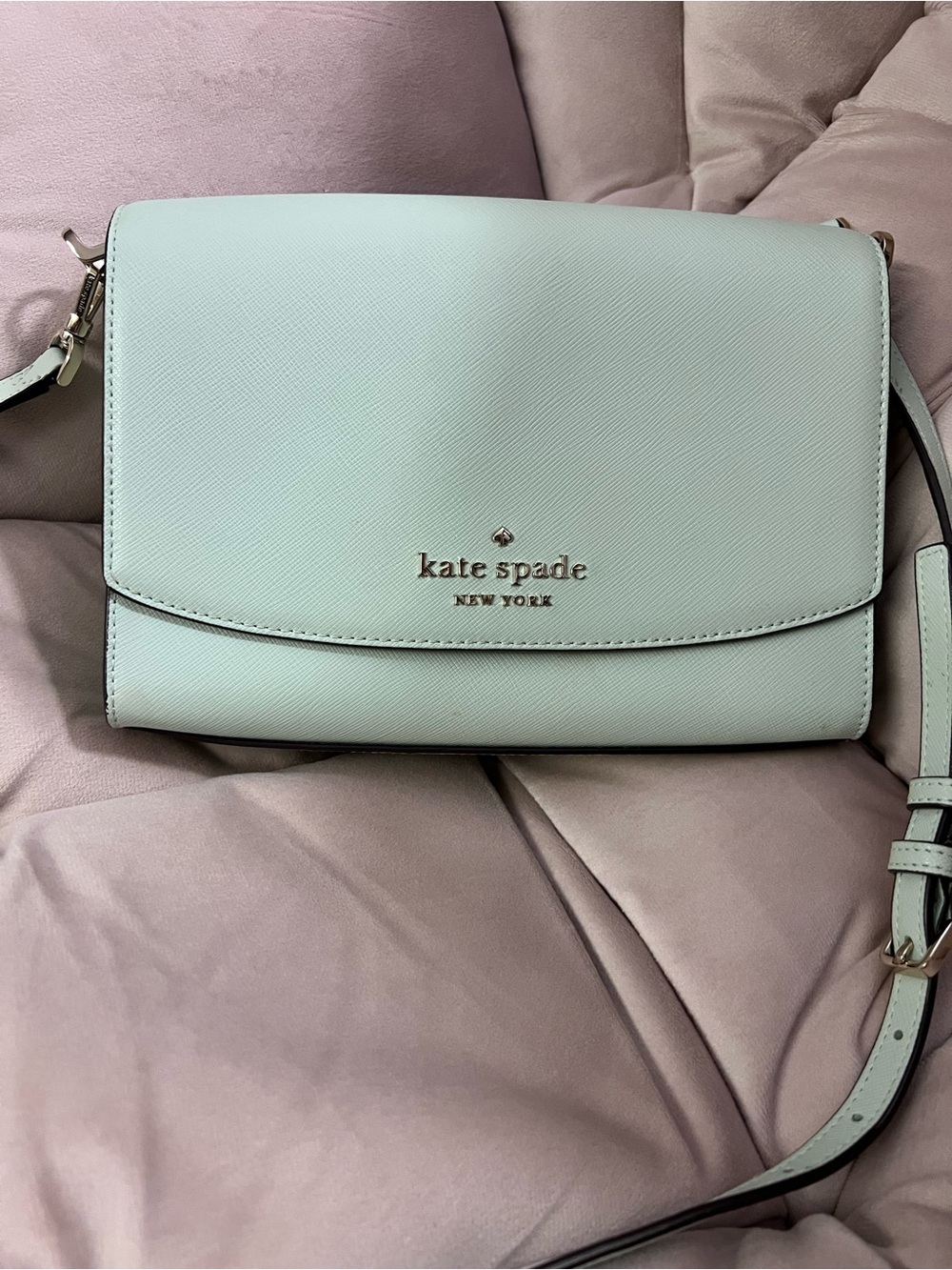 kate spade light blue flap crossbody with gold logo